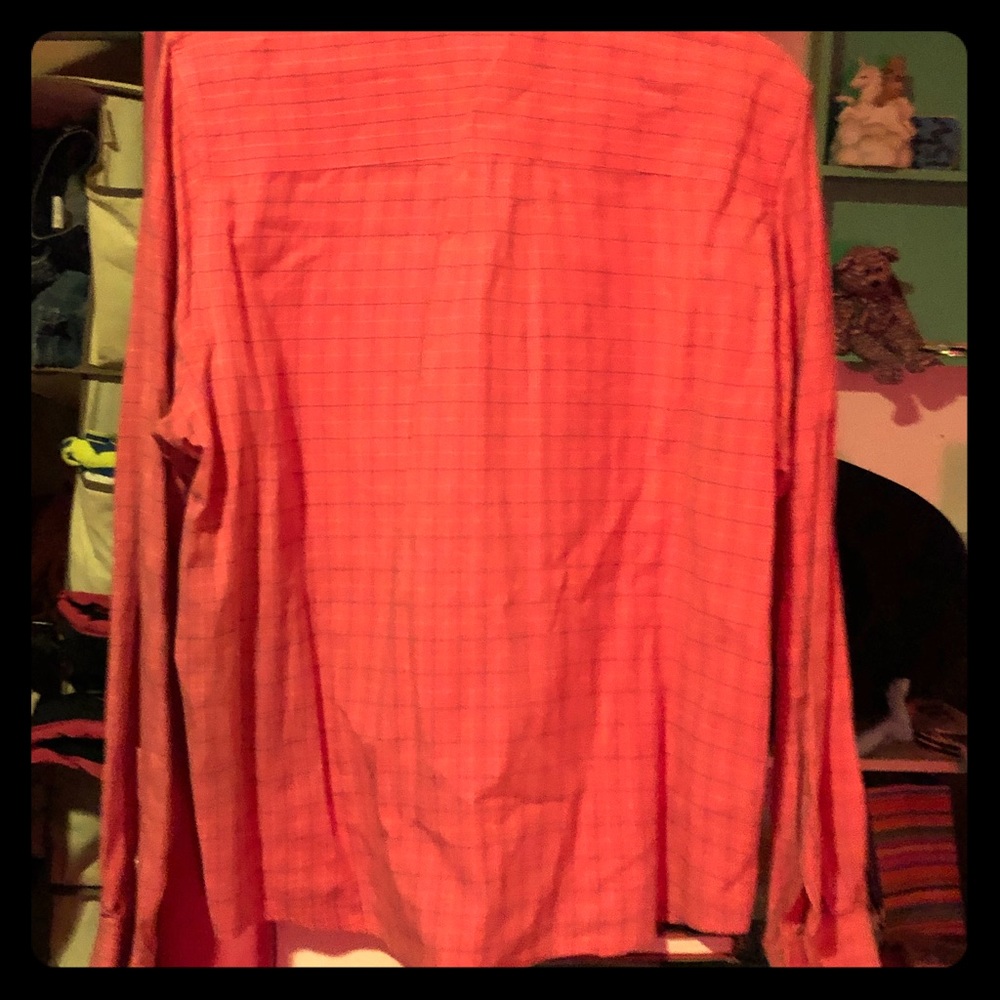 Pink and whit plaid western button up shirt.